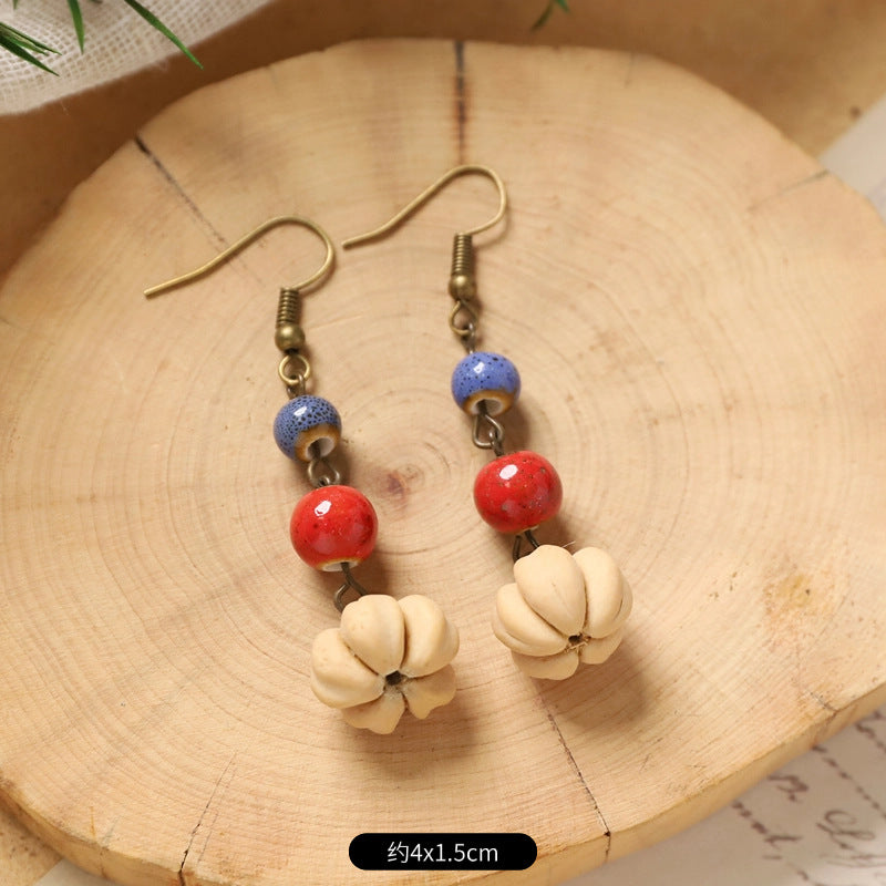 Flow of the Heart | Hawthorn Seed & Hand-Painted Porcelain Earrings